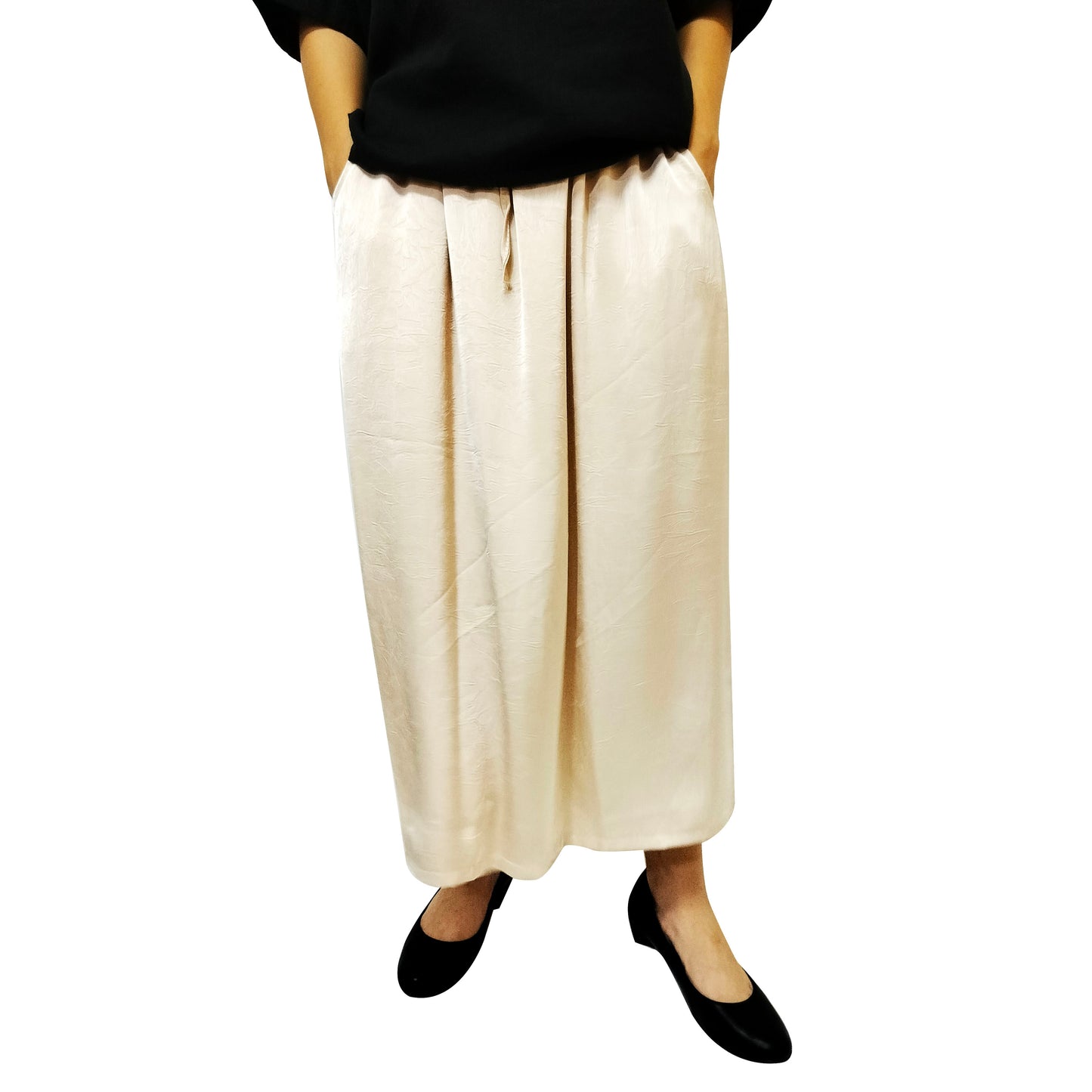 A summer loose-fit, slimming long skirt with a sophisticated, stylish, and elegant vibe, perfect for casual wear, featuring a side slit.