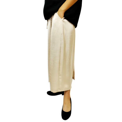 A summer loose-fit, slimming long skirt with a sophisticated, stylish, and elegant vibe, perfect for casual wear, featuring a side slit.