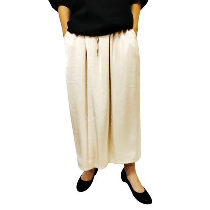 A summer loose-fit, slimming long skirt with a sophisticated, stylish, and elegant vibe, perfect for casual wear, featuring a side slit.