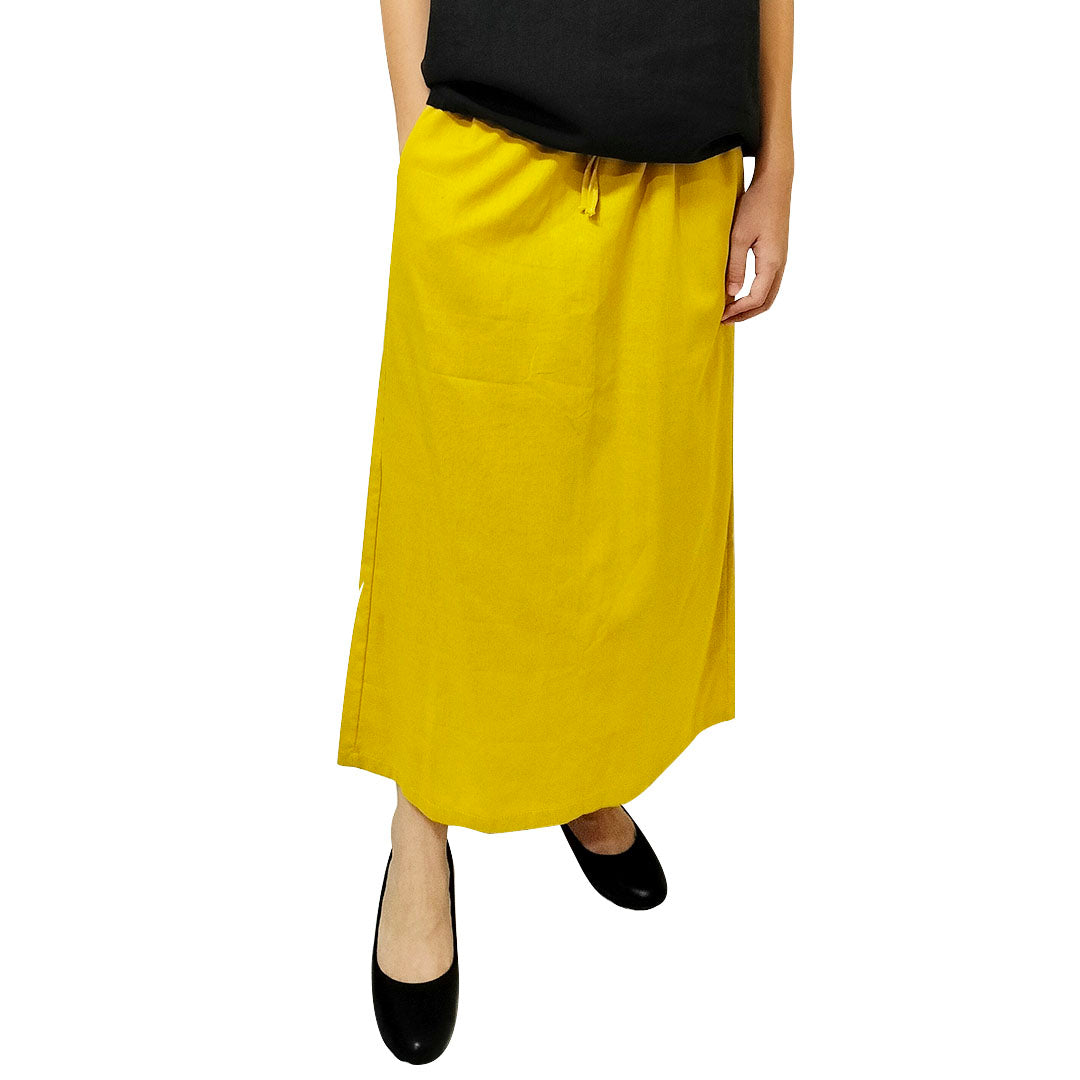 A summer loose-fit, slimming long skirt with a sophisticated, stylish, and elegant vibe, perfect for casual wear, featuring a side slit.