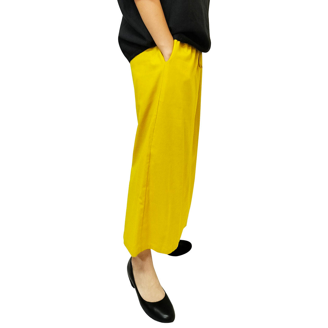 A summer loose-fit, slimming long skirt with a sophisticated, stylish, and elegant vibe, perfect for casual wear, featuring a side slit.